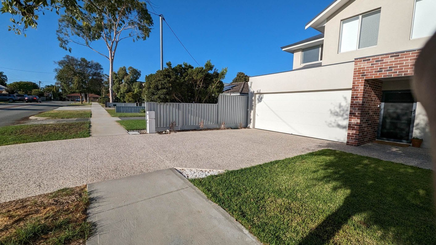 Finished concrete driveway with clean edges